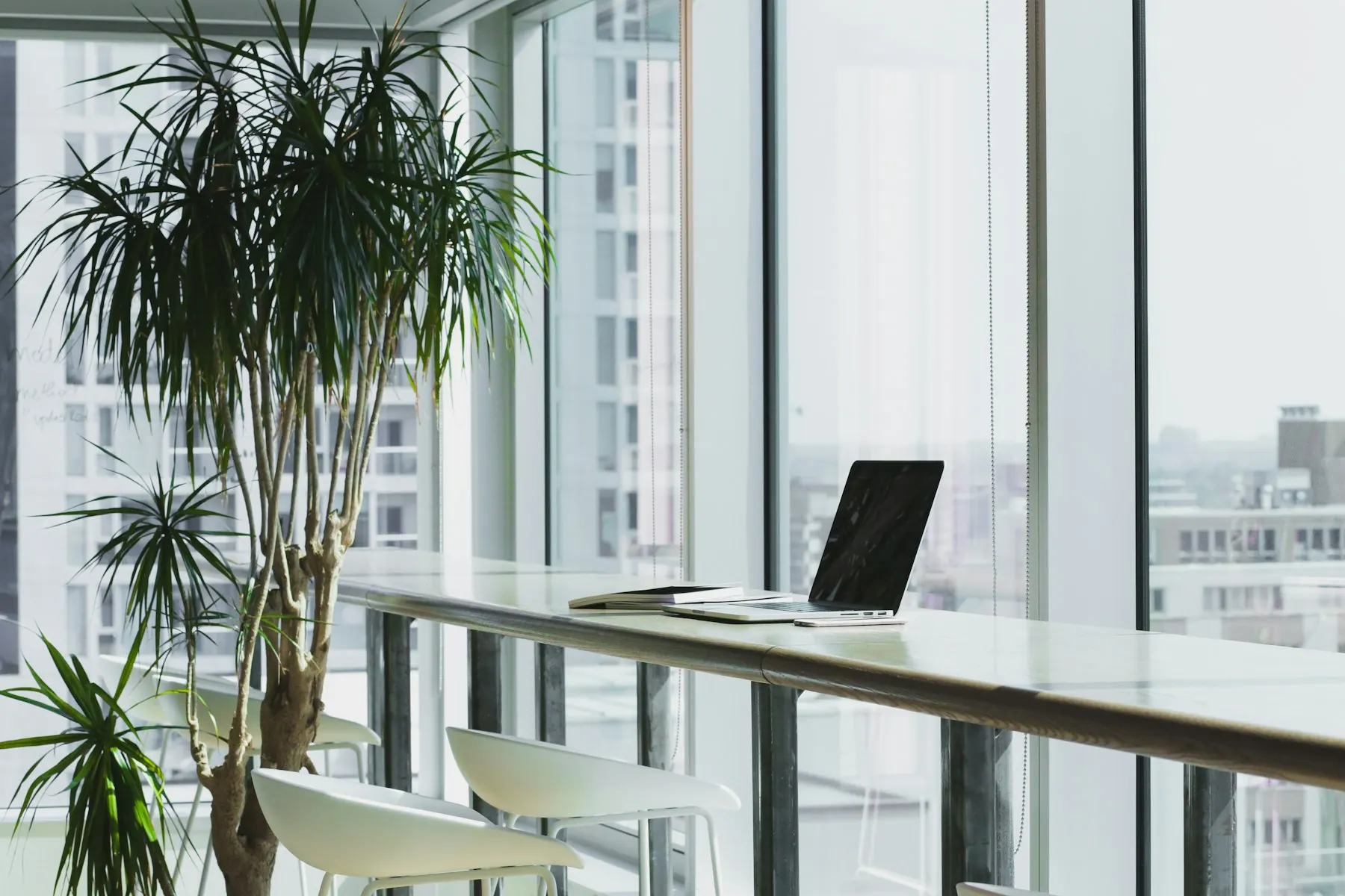 An open studio workspace with desks and monitors
